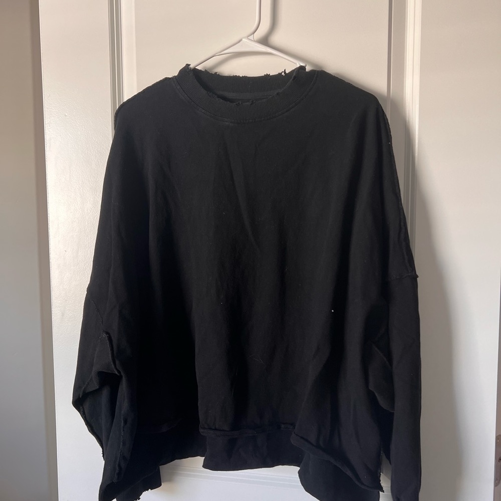 Distressed black sweater